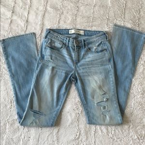 Low-rise ripped jeans. Never worn.